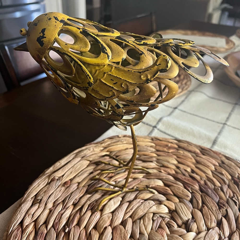 Cute rustic metal mustard bird